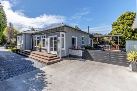 Spacious Character Home With Four Car Garaging