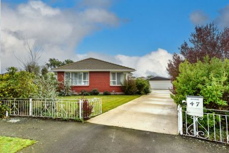 Extra Large Garaging Plus Carport