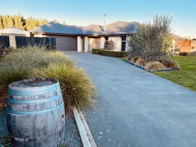 Fabulous Home With Four Car Garaging