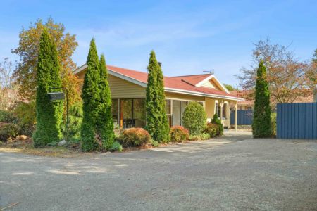 Large Family Home with Extensive Garaging