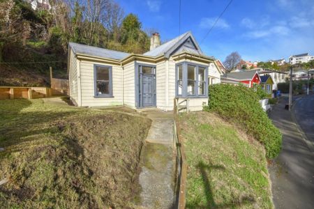 Renovator’s Gem – Villa Packed with Potential