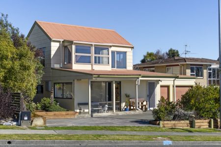 Three Bedroom Home with Lots of Extra Rooms!