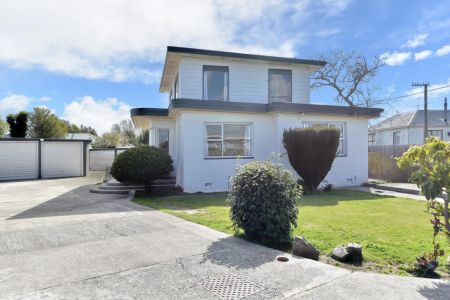 Retro Renovator With Six Car Garaging!