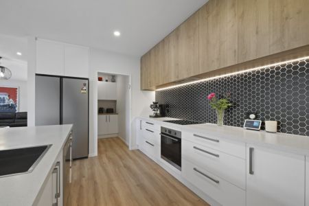 The Benefits Of Near New With No Building Stress.