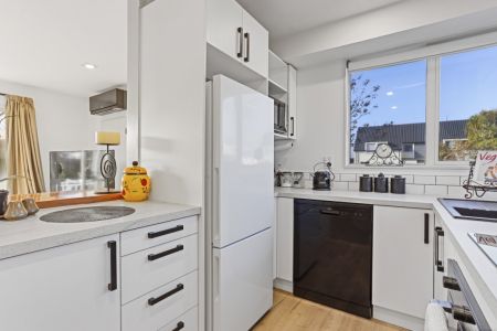 Excellently Renovated Single Level Townhouse