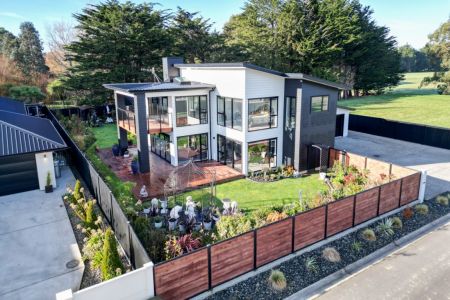 Executive Living With Exceptional Garaging.
