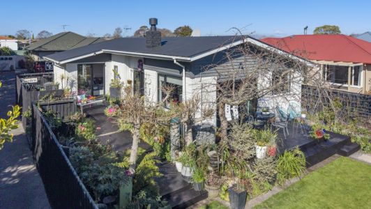 Double Glazed And Lovingly Landscaped!