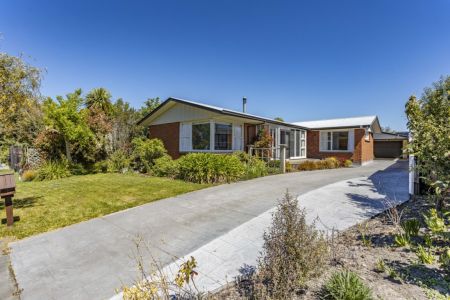 Quiet Location, Solid Home, Excellent Garaging